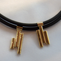 Collier rubber goud. Oude trouwring